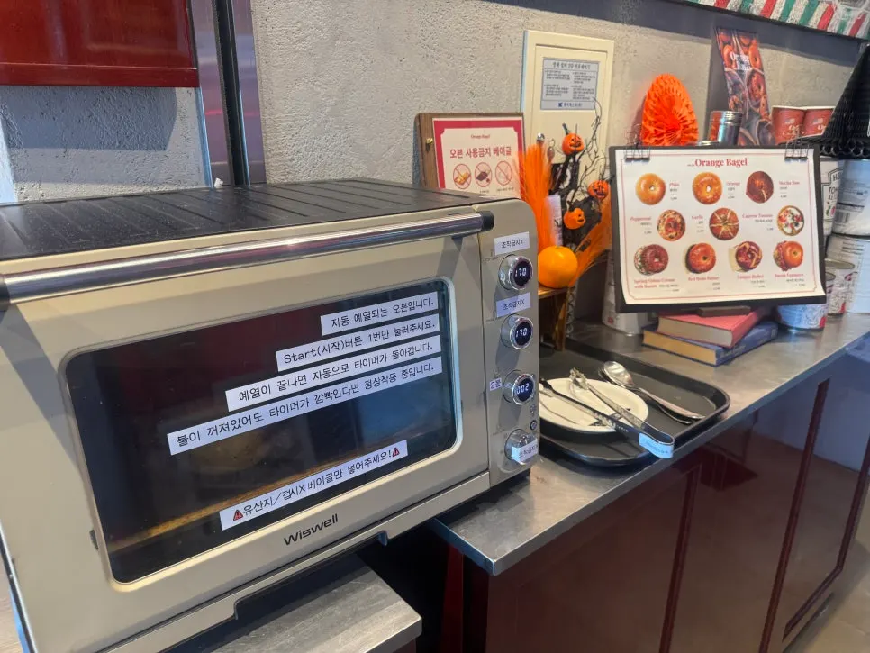 Oven for warming bagels near the 2nd floor entrance