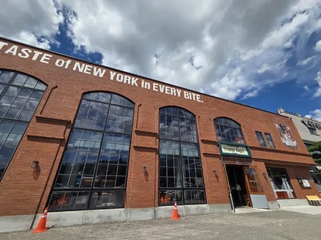 Orange Bagel's building under a blue sky