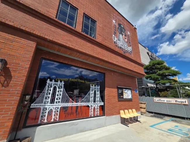 Orange Bagel's exterior wall with English lettering
