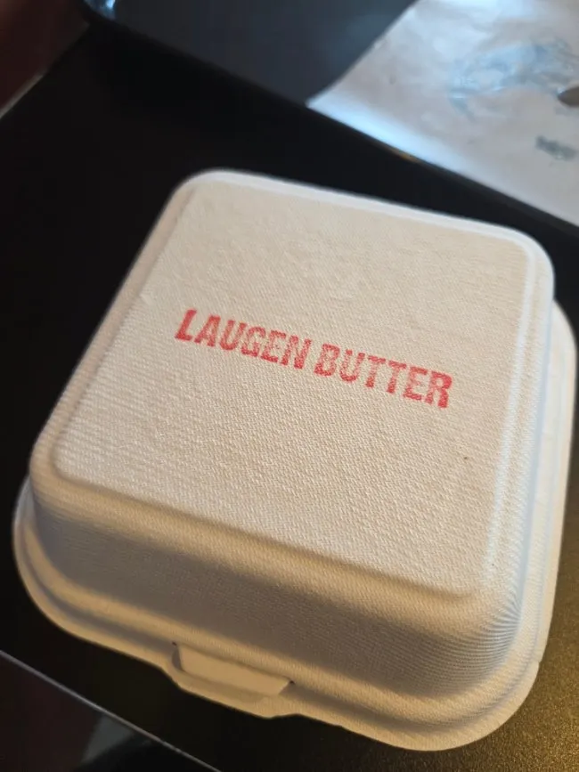 Glossy pretzel-style Laugen butter bagel