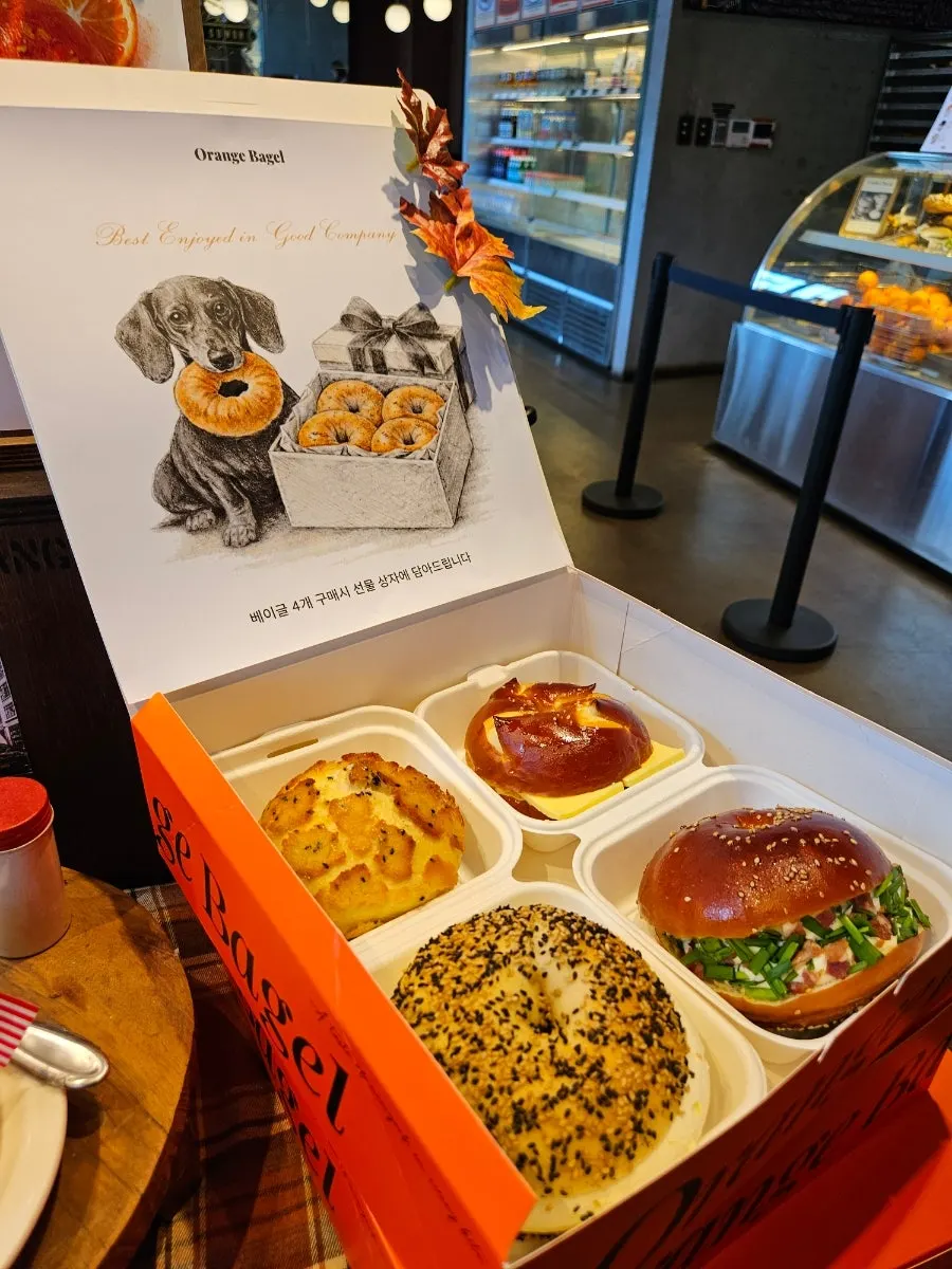 Orange-colored box for packing 4 bagels