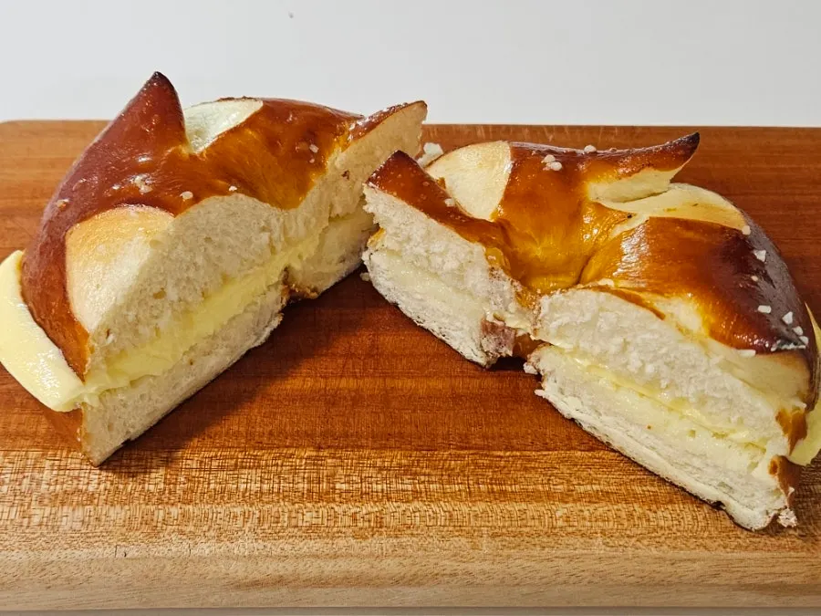 Bacon bagel filled with scallion cream cheese