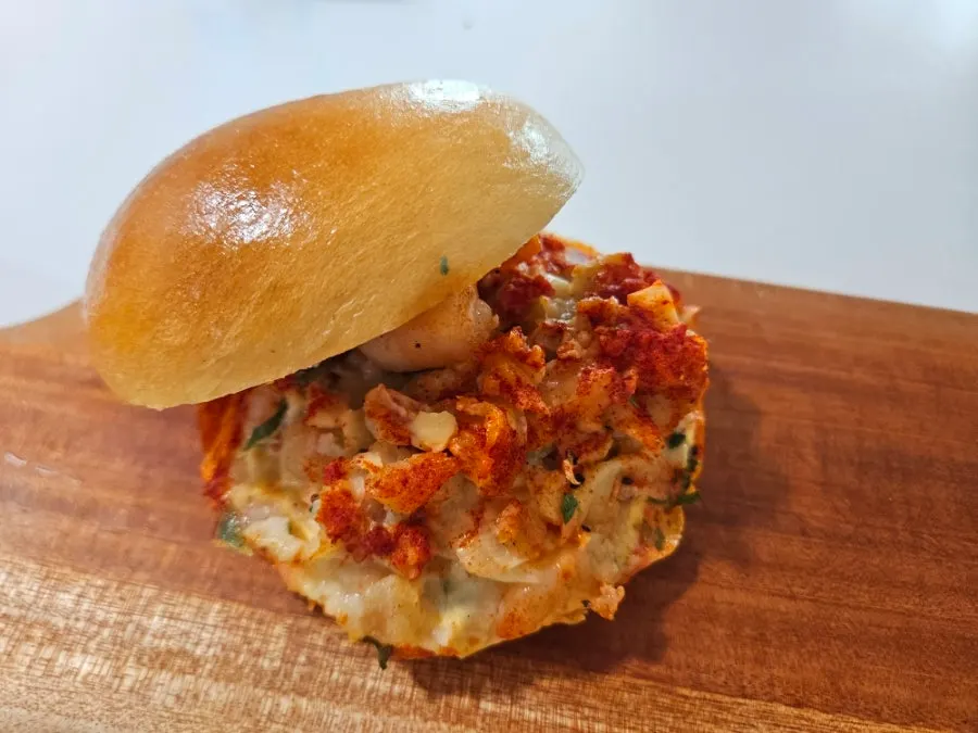 Crab shrimp bagel topped with seafood