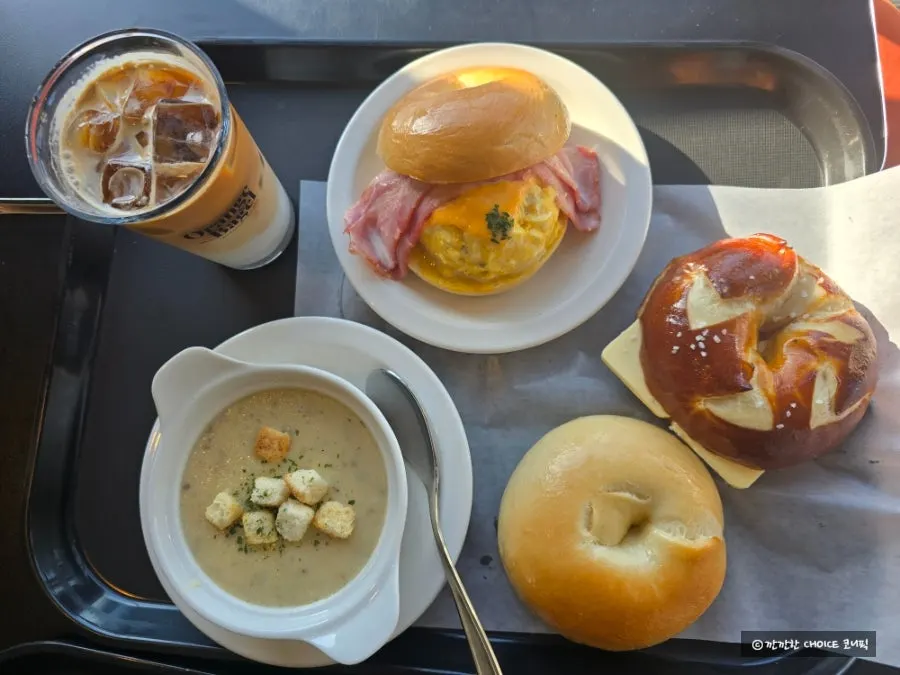 Warmed bacon egg mayo bagel and Laugen bagel