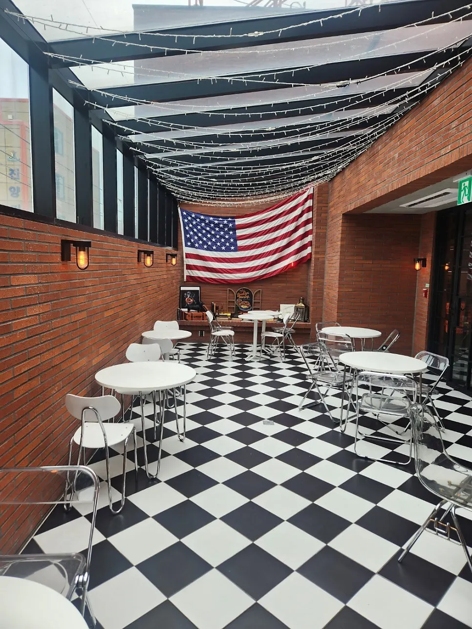 Orange-colored interior on the second floor of Orange Bagel