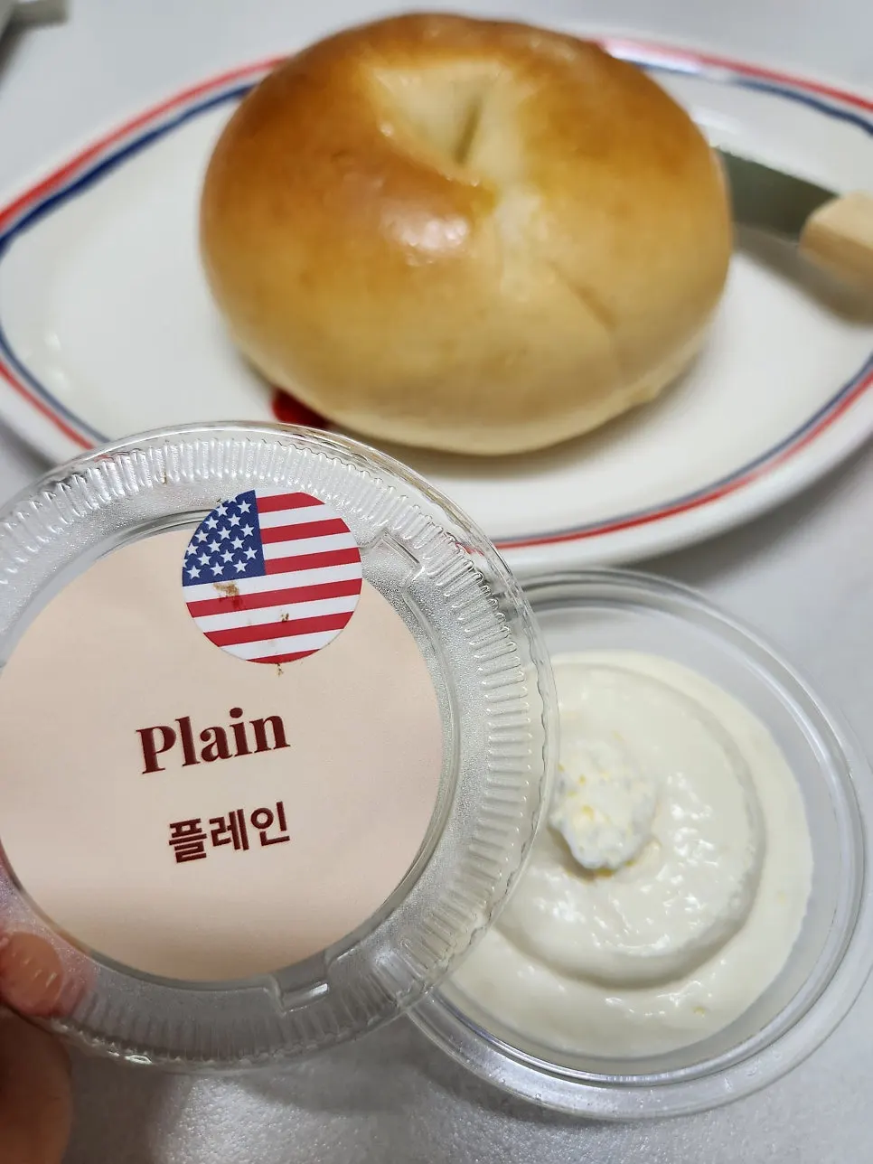 Plain bagel paired with plain cream cheese