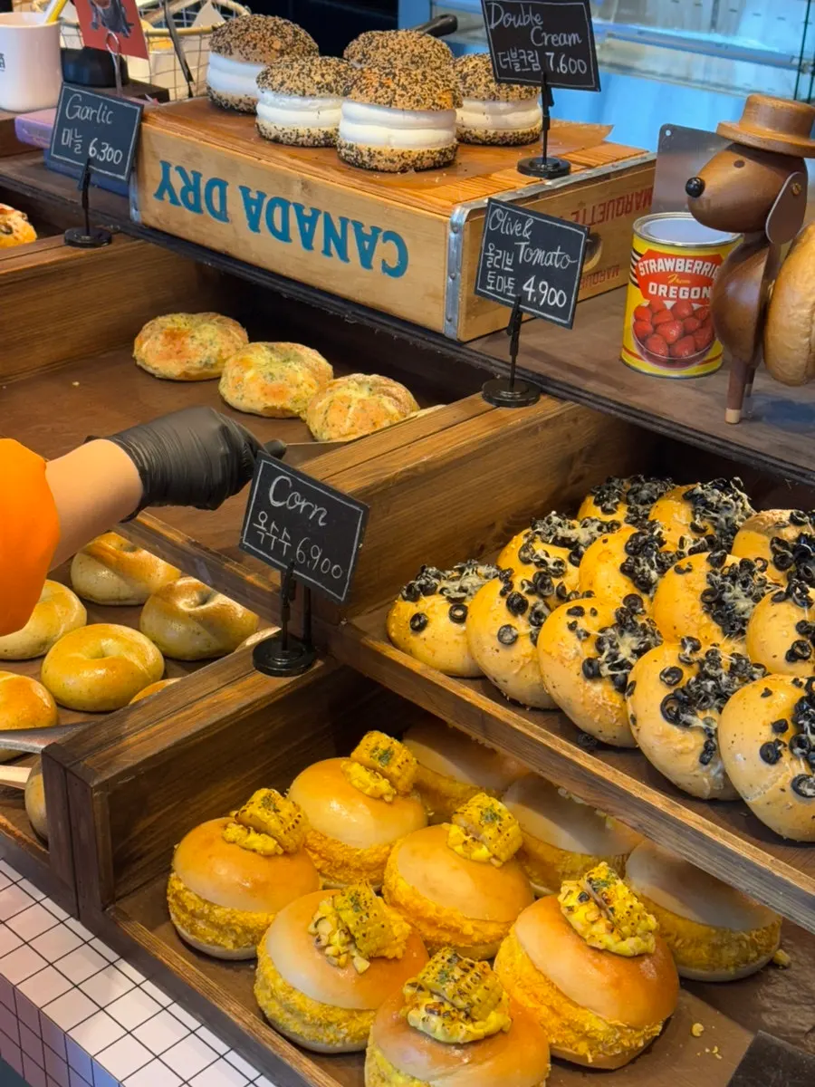 Bagel varieties displayed at Orange Bagel