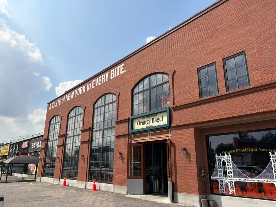 Orange Bagel café building in Suwon, built from red-brown brick