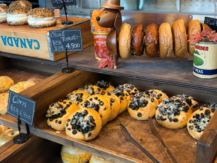 Olive tomato bagel loaded with olives