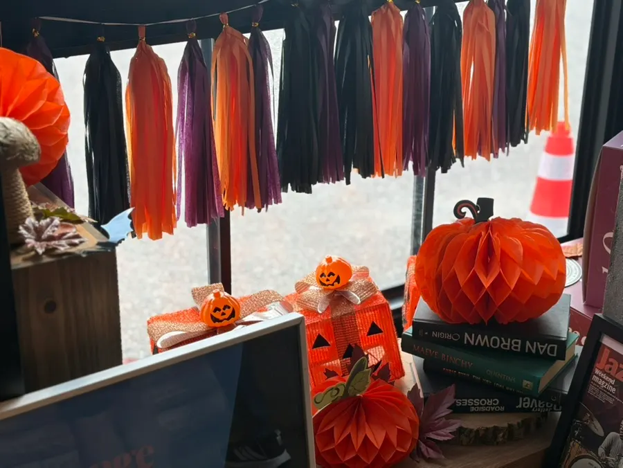Halloween interior decorated with pumpkins at Orange Bagel