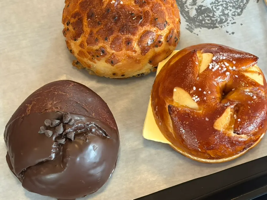 Three bagels laid out on the table