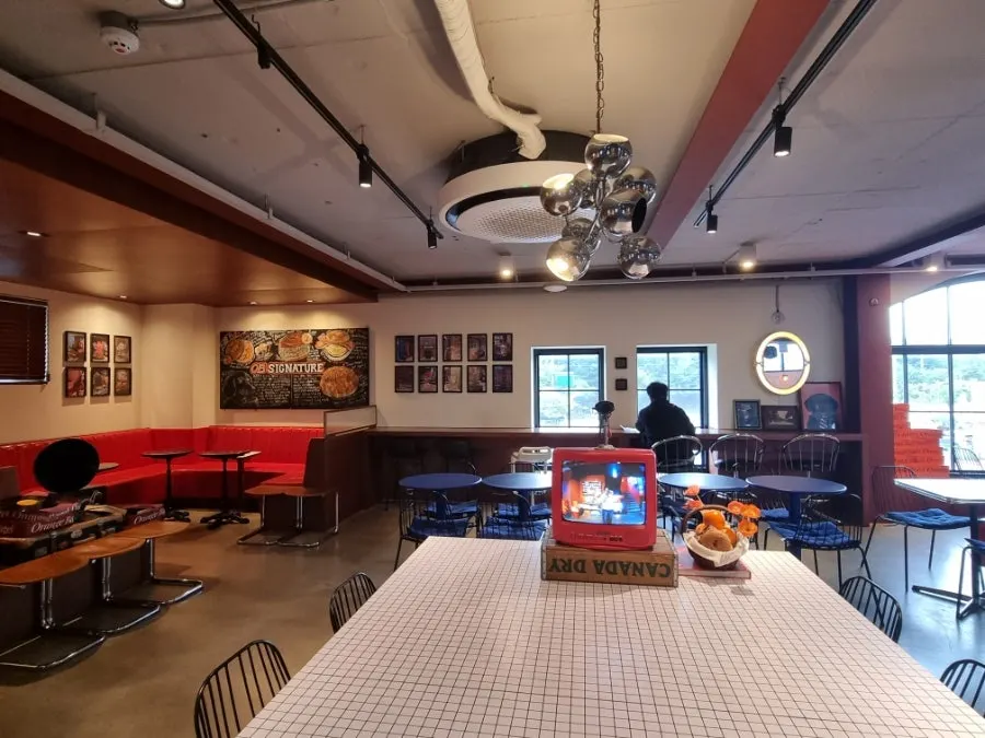 Seating area with an exotic atmosphere at Orange Bagel