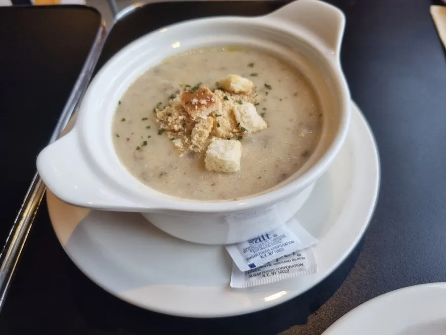 Mushroom cream soup served alongside the bagels