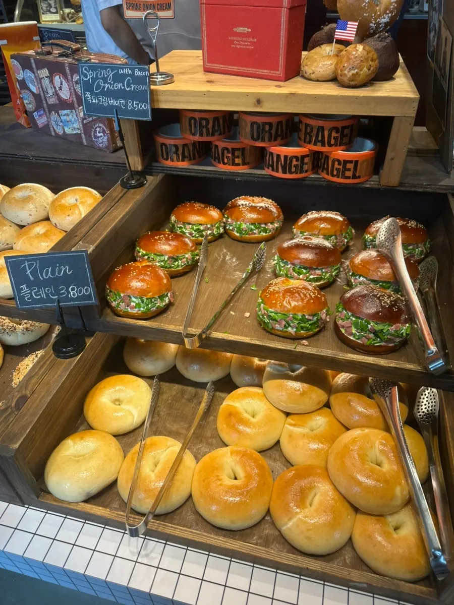 Various bagels displayed on the counter
