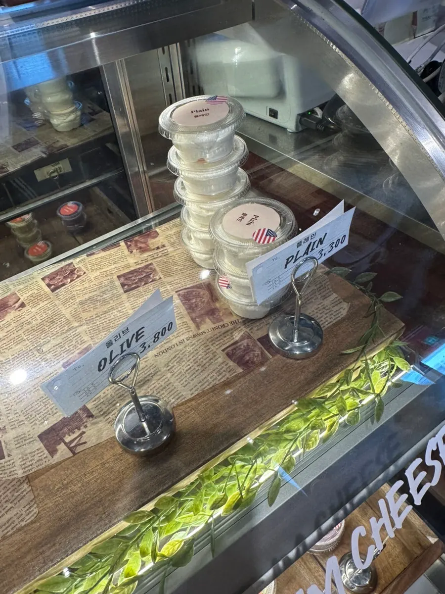 Cheeses and basil sauce for spreading on bagels