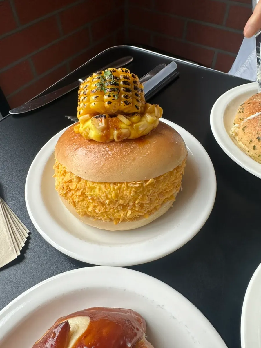 Mushroom soup and corn bagel cutting trick at Orange Bagel, a Suwon brunch café
