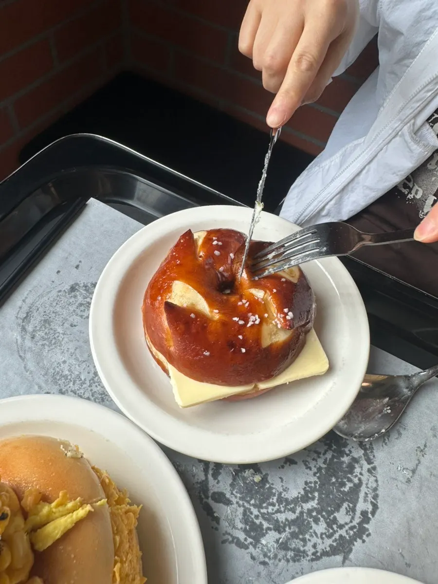 Bagel and soup plated together