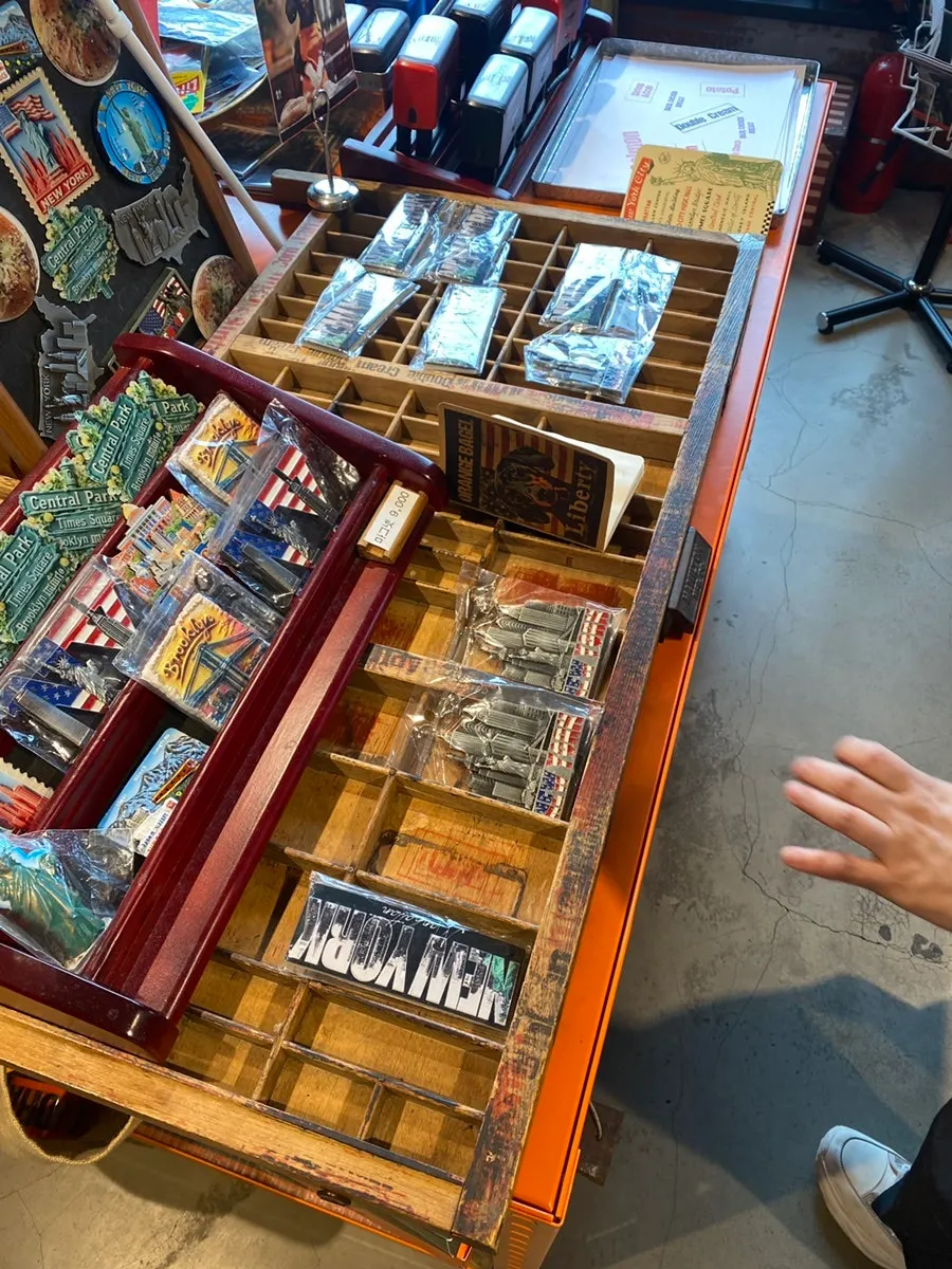 Overview of Orange Bagel's goods shop display