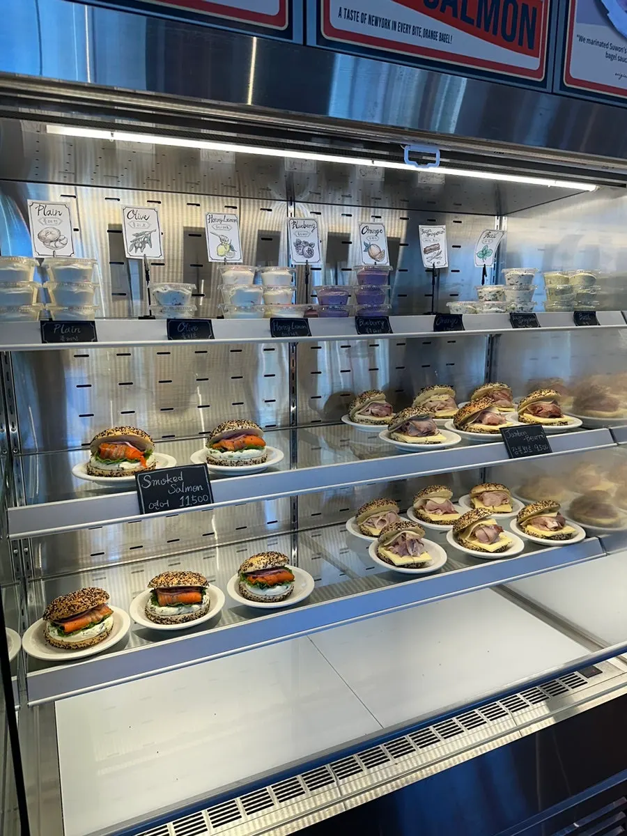 Bagel selection area at Orange Bagel