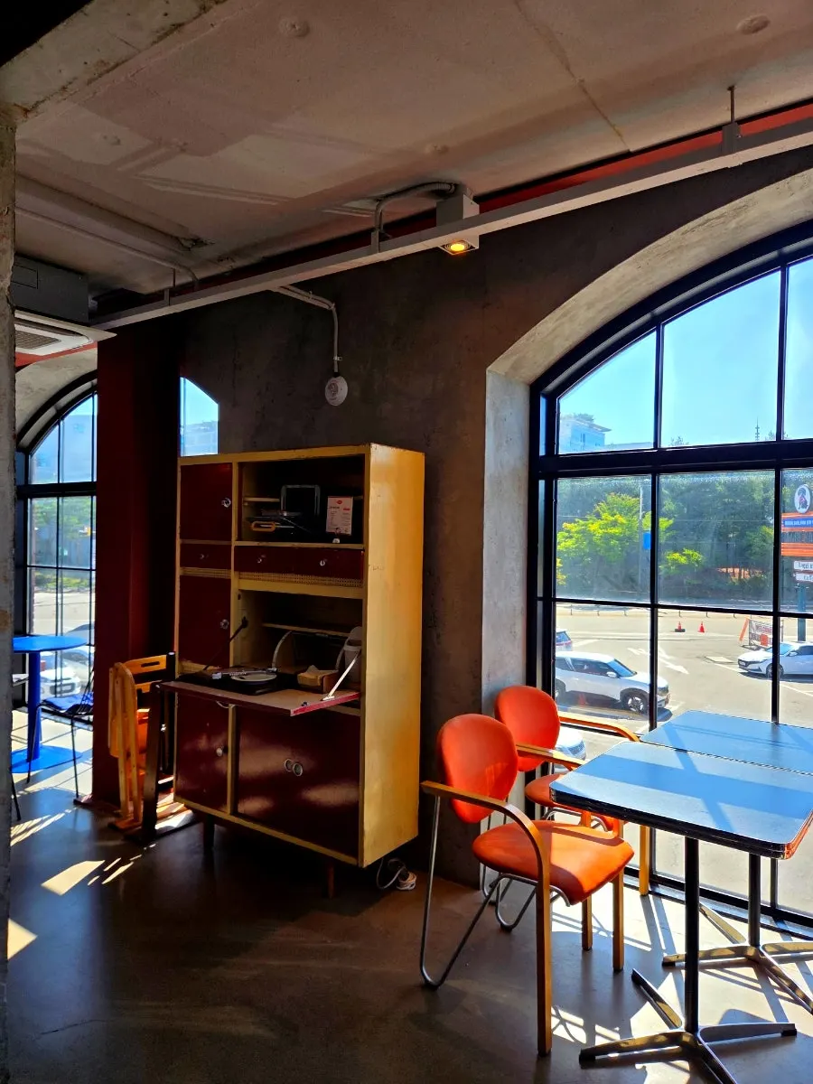Group seating and terrace at Orange Bagel