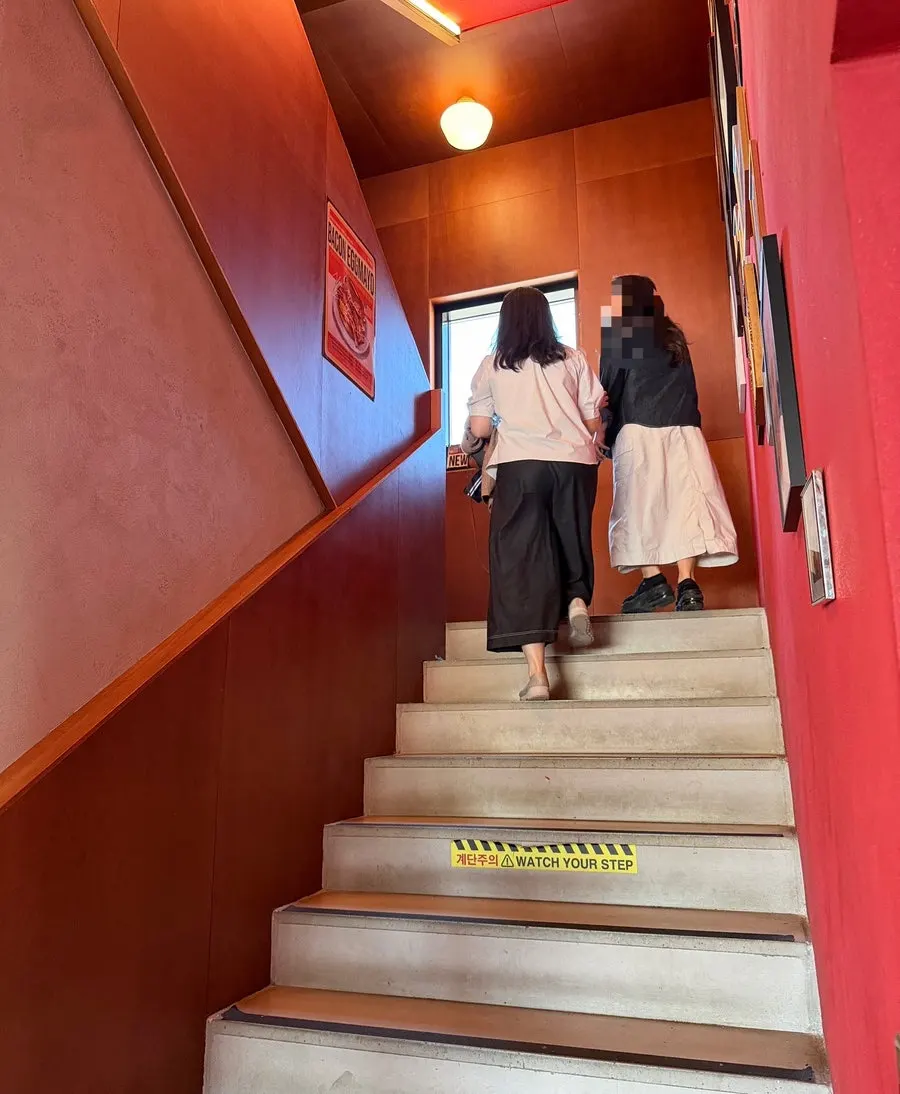 1st-floor order counter and seating at Orange Bagel