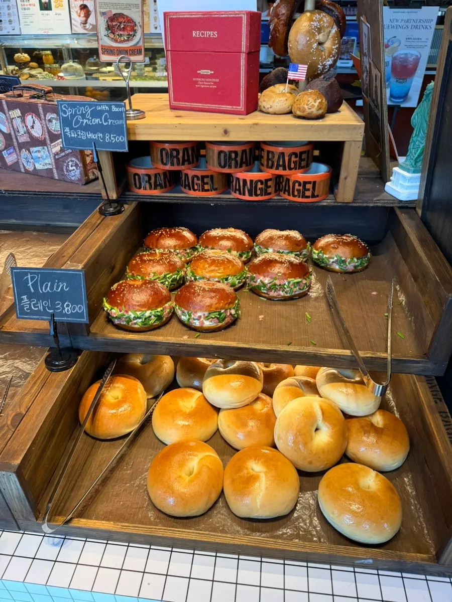 Various bagels displayed on the shelf