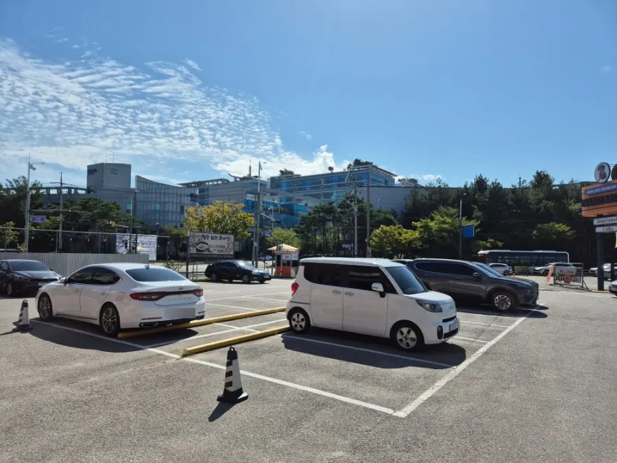 View of the Orange Bagel building and its spacious parking lot