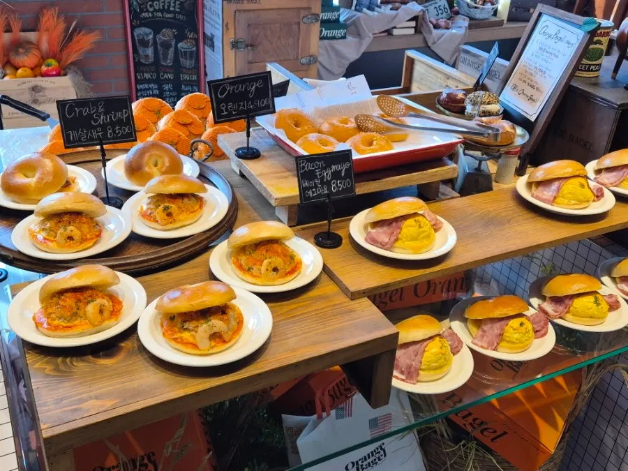 Bagels packed in an orange takeout box