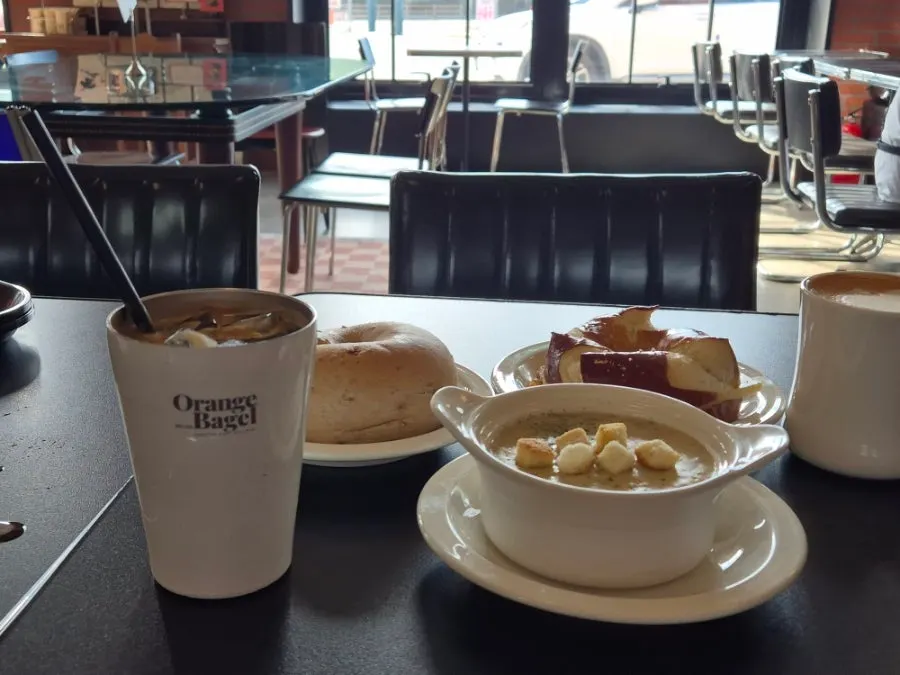 Spacious seating area on Orange Bagel's 2nd floor