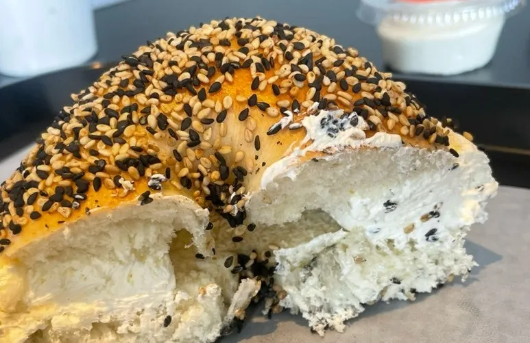 Inside of the Laugen bagel showing a whole chunk of butter