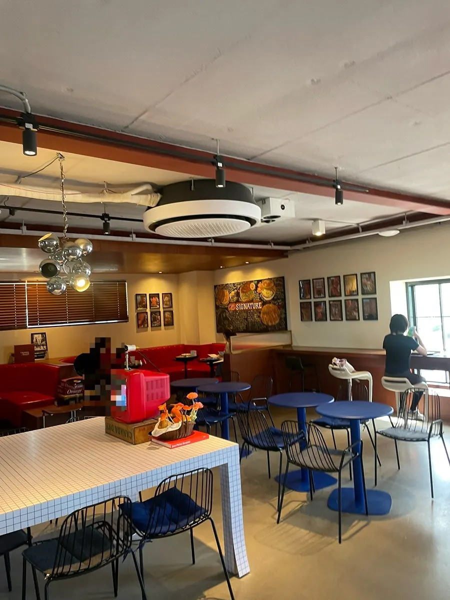 First-floor seating area at Orange Bagel