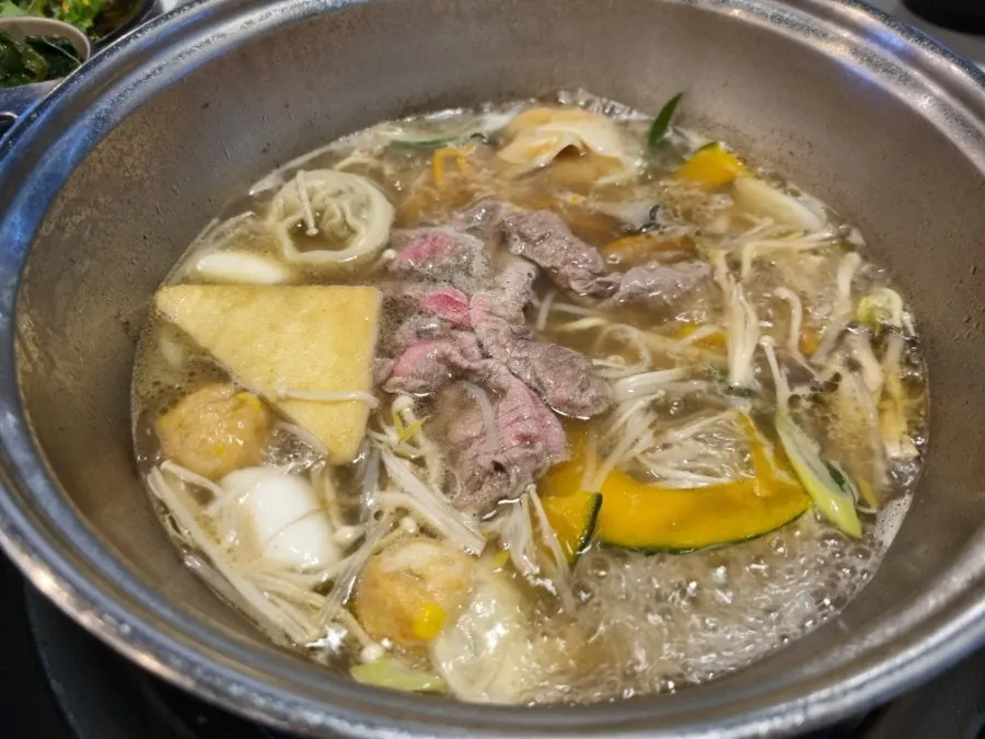 Finishing with kalguksu noodles in the remaining broth