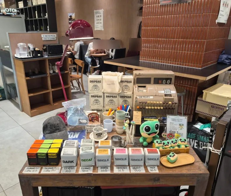 Coffee beans, drip bags, and café goods