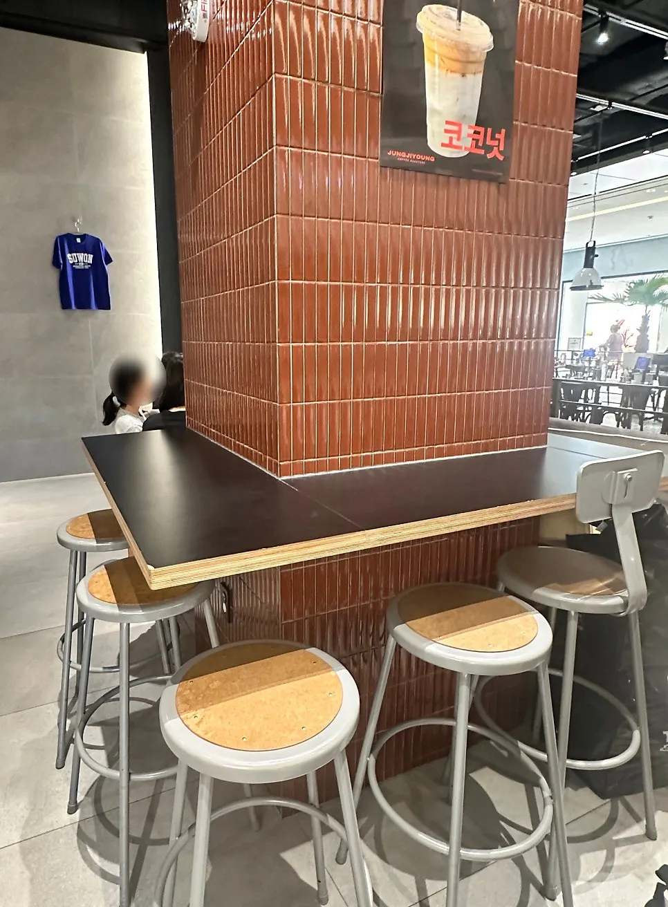 Space behind the bar seating for parking a stroller