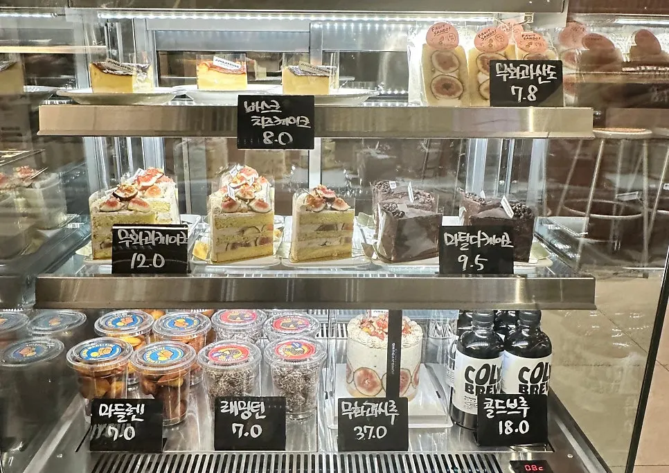 Assorted desserts displayed in the showcase