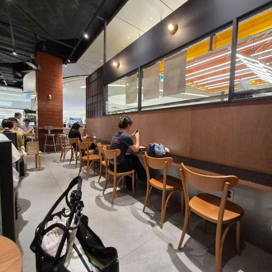Seating inside Jeong Jiyeong Coffee Roasters with jazz playing