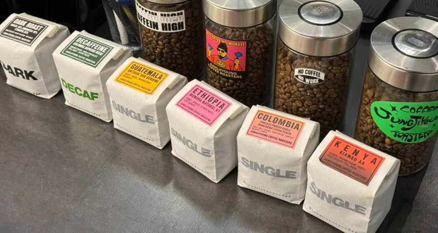 Bean display shelf near the front of the store