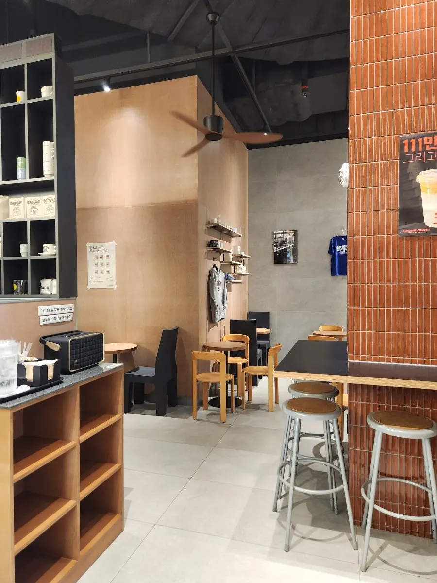 Café interior with tables and bar seats