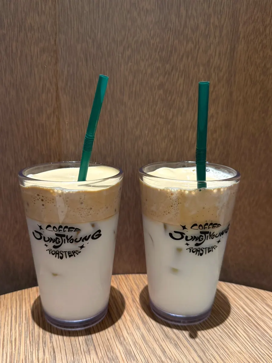 Two ordered cups of decaf coconut coffee