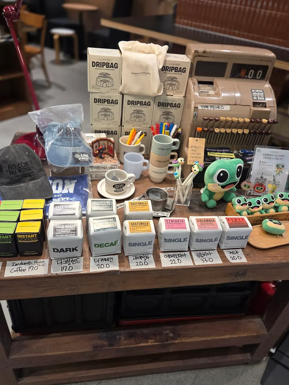 Shelf with coffee bean packages and drip bags