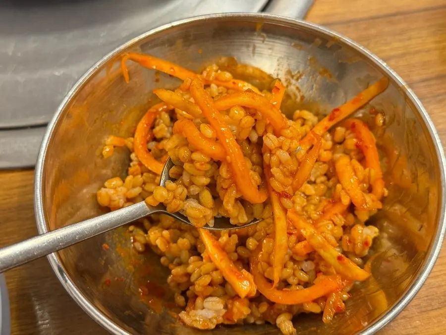 Barley rice mixed with radish salad and gochujang