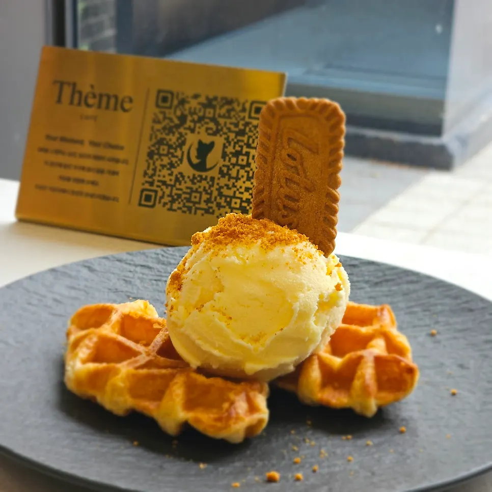 Lotus croffle topped with vanilla ice cream