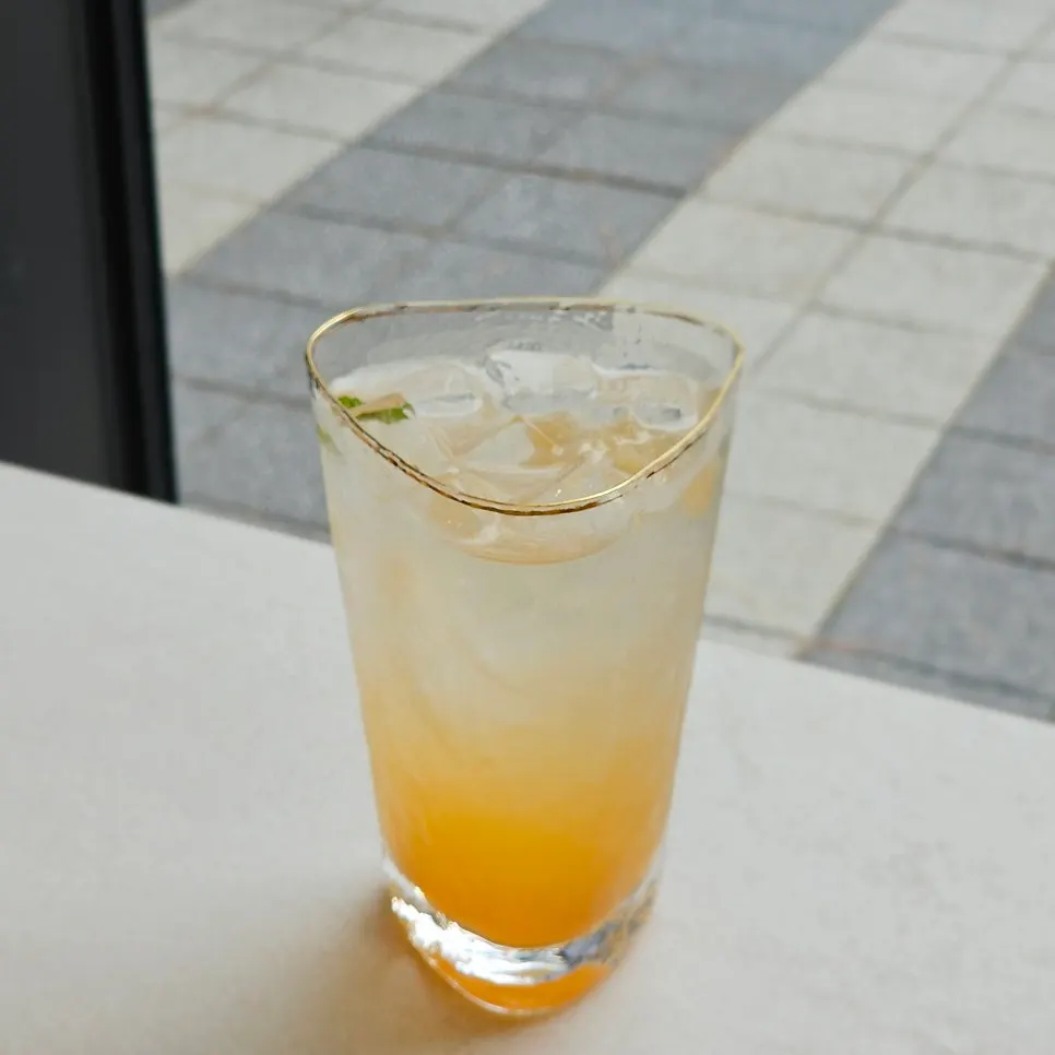 Sweet peach tea paired with the Lotus croffle