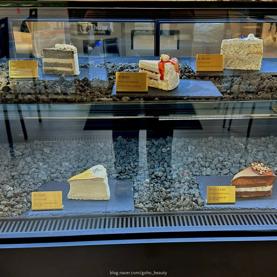 Café showcase displaying slice cakes