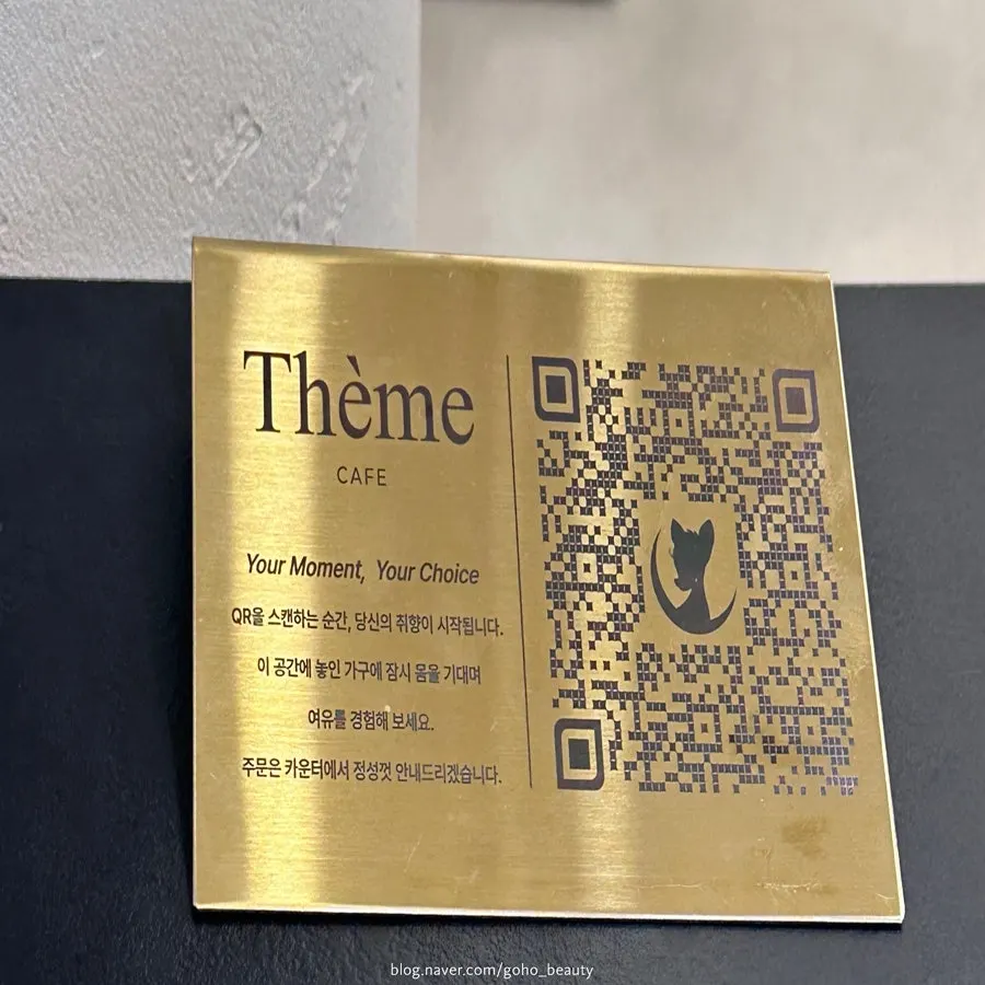 Gold QR menu sign on the table