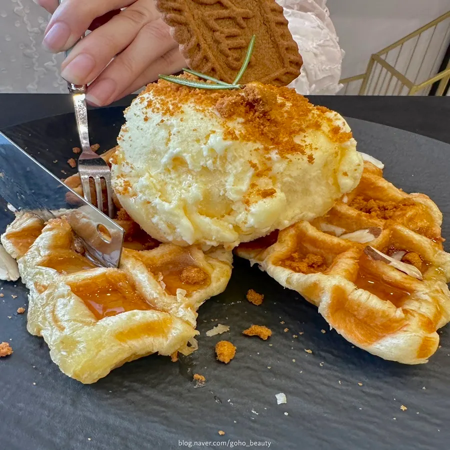 Croffle cut into bite-sized pieces topped with ice cream