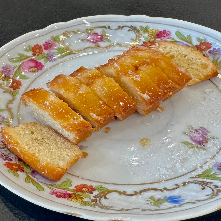Moist cross-section of the salted caramel finansier cut in half