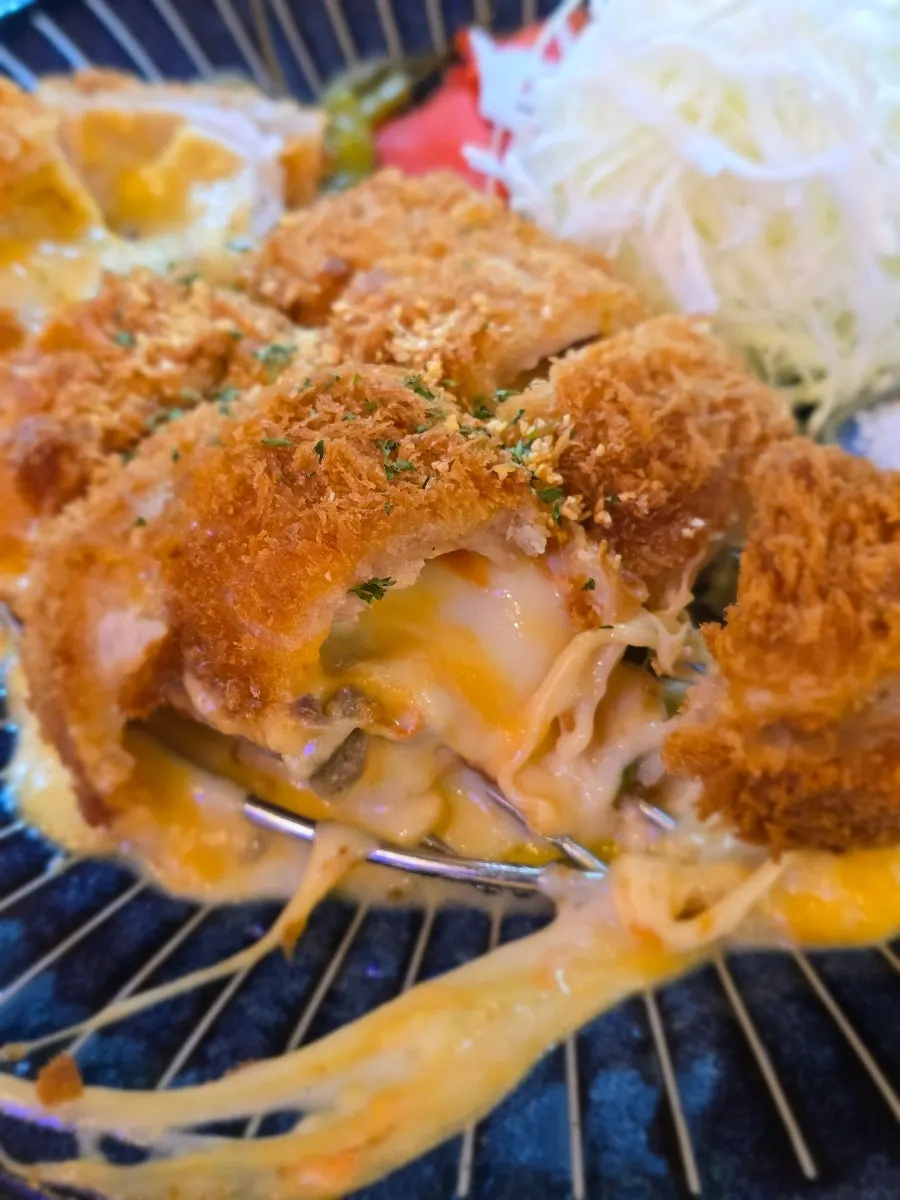 Inside the cordon bleu cutlet with cheese and vegetables