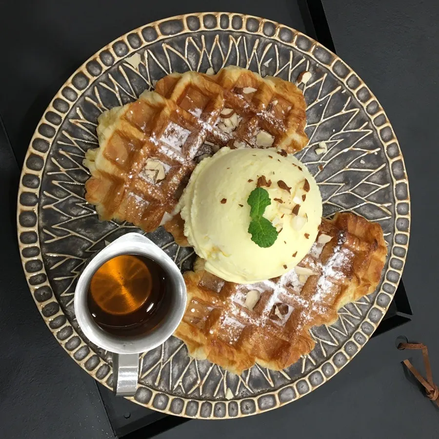 Plate of croffle topped with ice cream