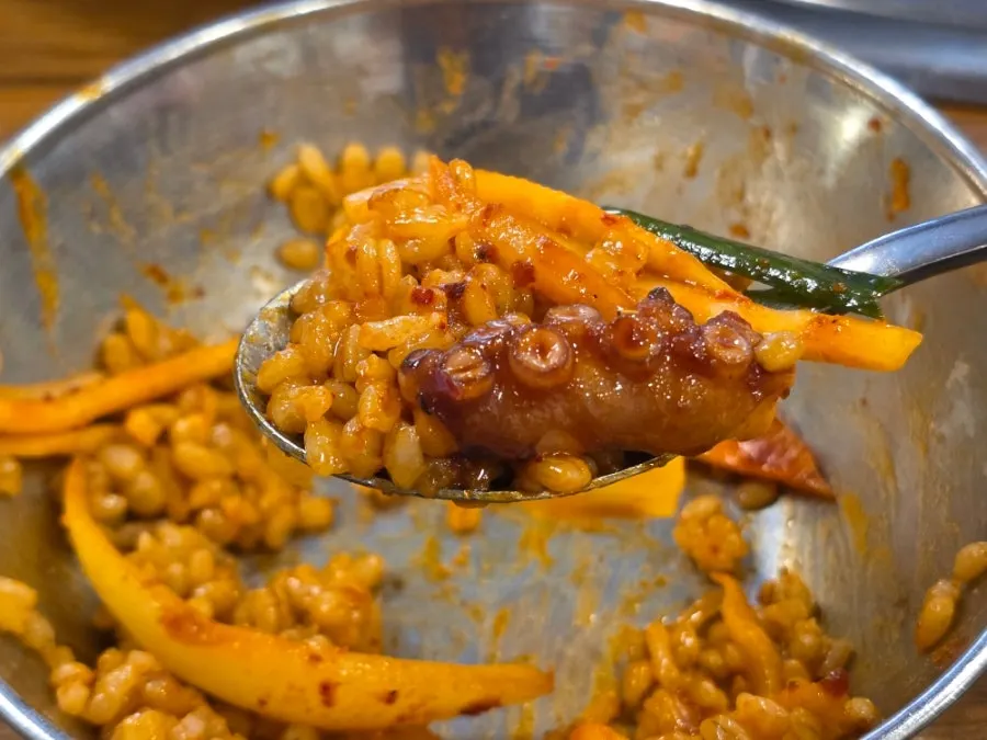 Close-up of the concentrated seasoning on the stir-fried octopus